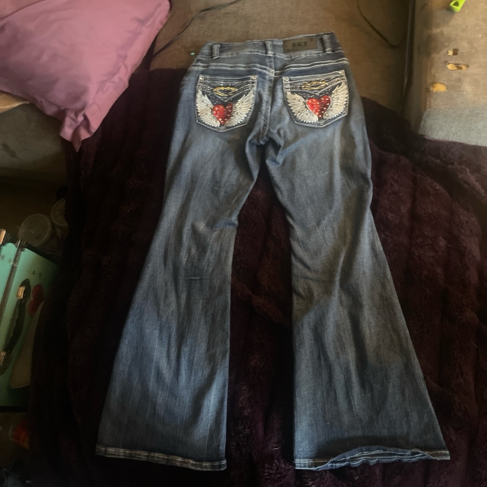 Sky Blue Flare Jeans with Embellished Heart Wing Back Pockets